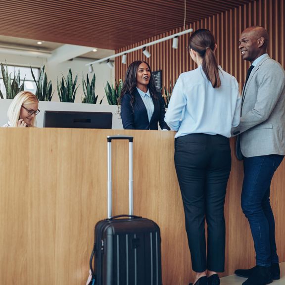 Couple at hotel check in